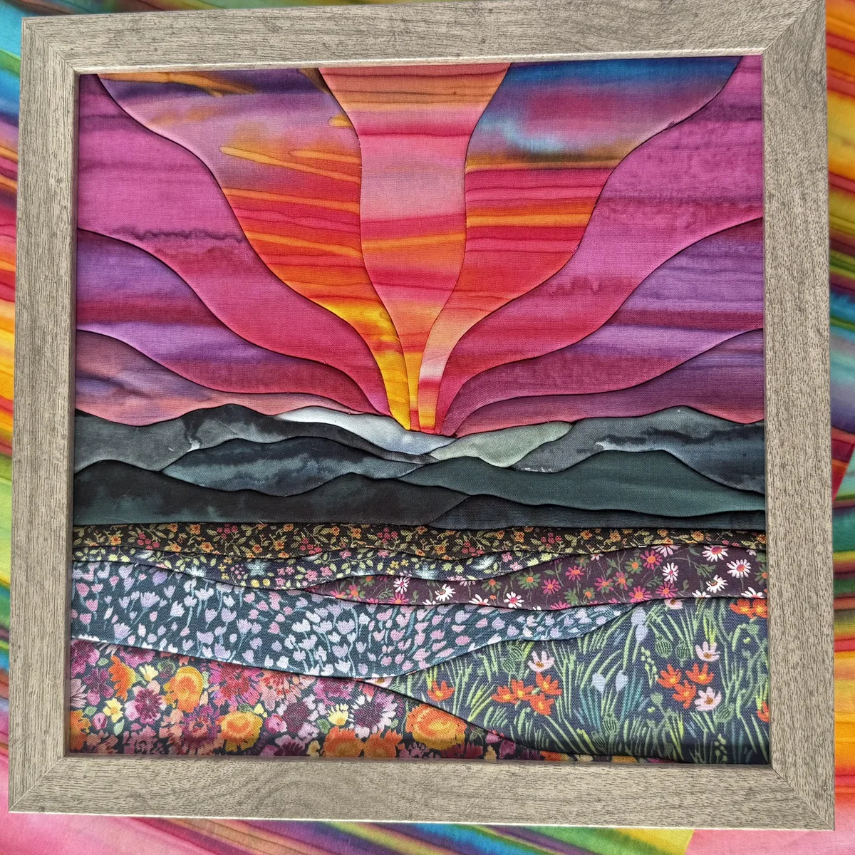Sunrise Over the Cascades, a 9 by 9 inch kinusaiga fabric landscape of mountains at sunrise